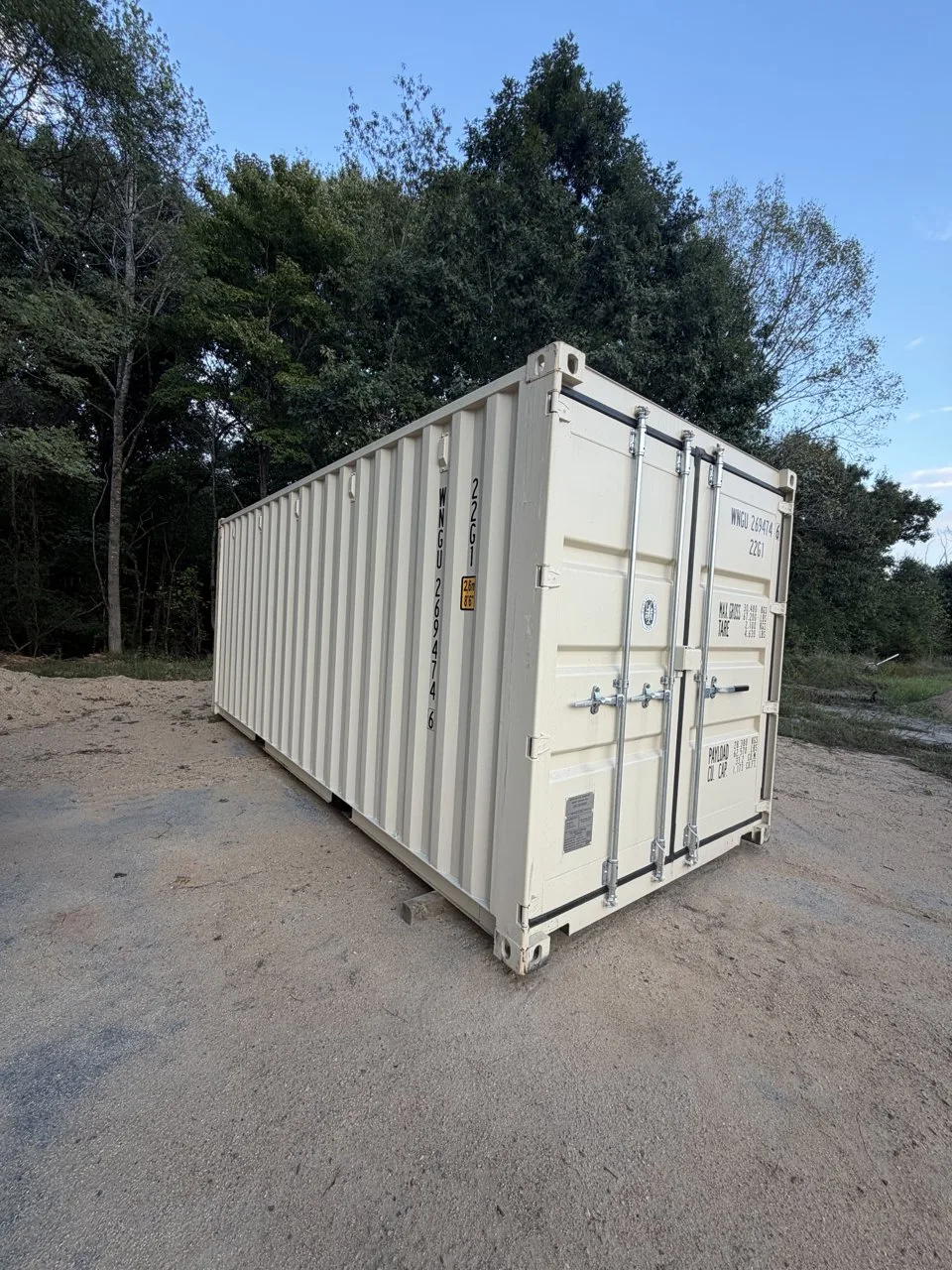 White 8x20 steel storage container with lockable double doors